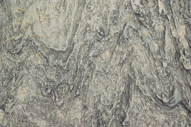 Grey granite rock background texture