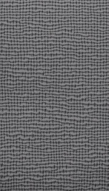 Photo grey knitted fabric cotton textured background closeup with copy space for your design