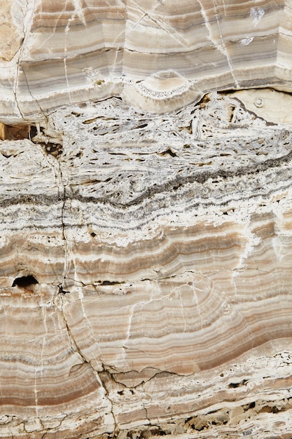 Foto superficie della lastra di pietra di granito di marmo grigio chiaro giallo