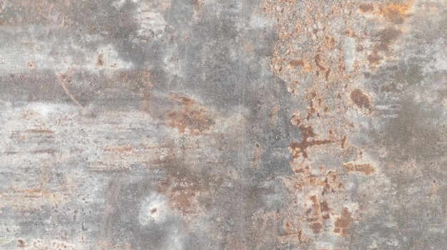 Grey metal background old and oxidized rusty steel sheet plate gray