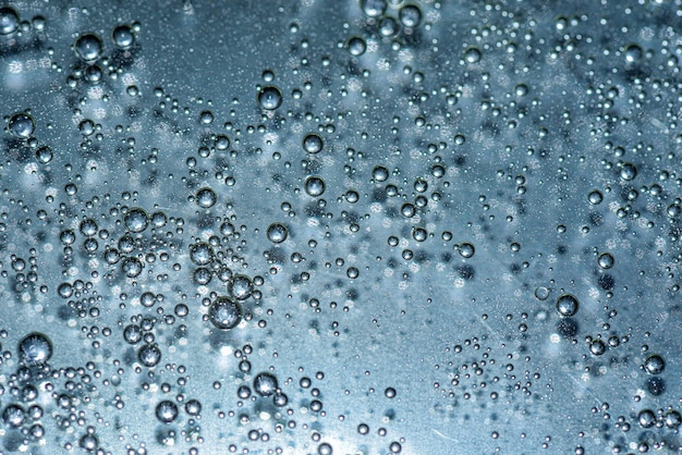 Photo grey oil bubbles on colourful background