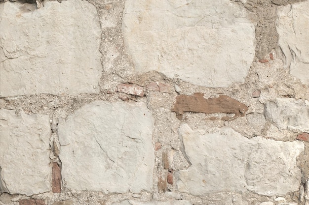 Grey old brickwork texture ancient brick wall