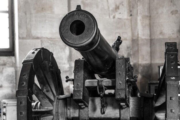 Grey scale close up shot of metallic cannon artillery