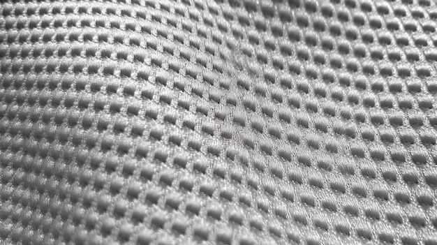 Photo grey soccer fabric texture with air mesh sportswear background