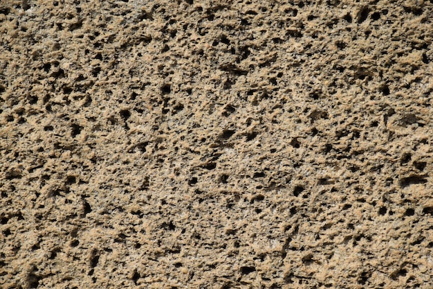 Grey stone texture with many hole