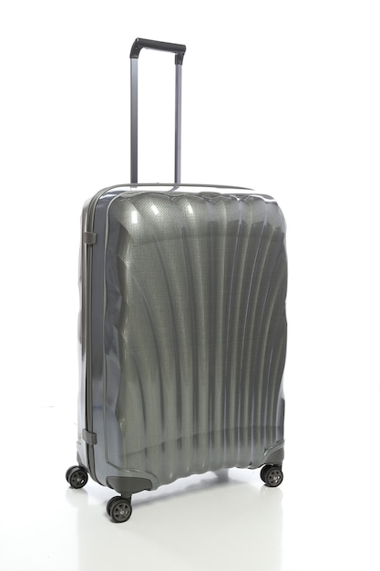 Grey suitcase on white background