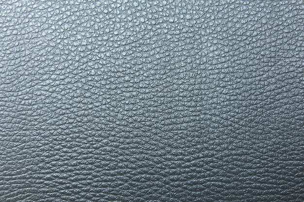 Grey textured leather surface