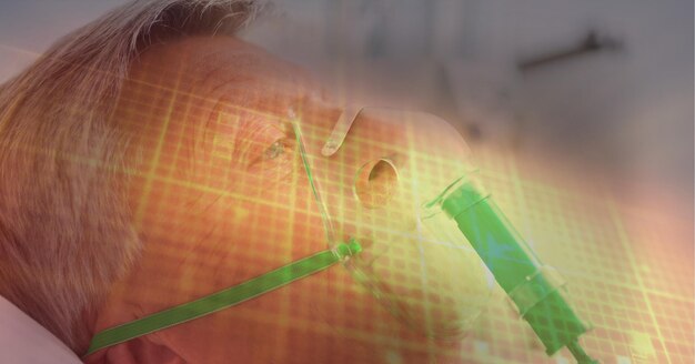 Grid lines over a senior man in an oxygen mask, healthcare concept