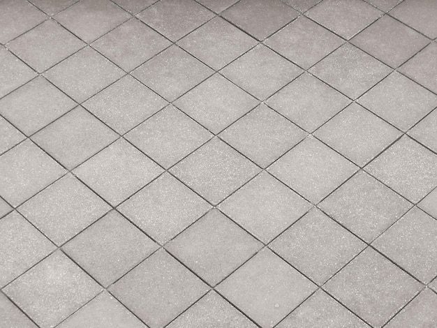 Grijze achtergrond van betonnen vloer in industriële stijl