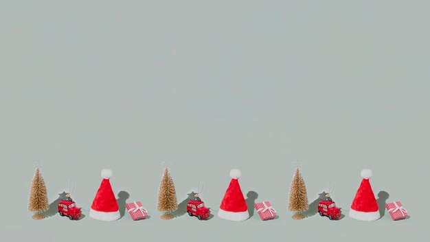 Foto grijze achtergrondpatroon met kerst- of nieuwjaarssymbool attribuut objecten symbolische items concept