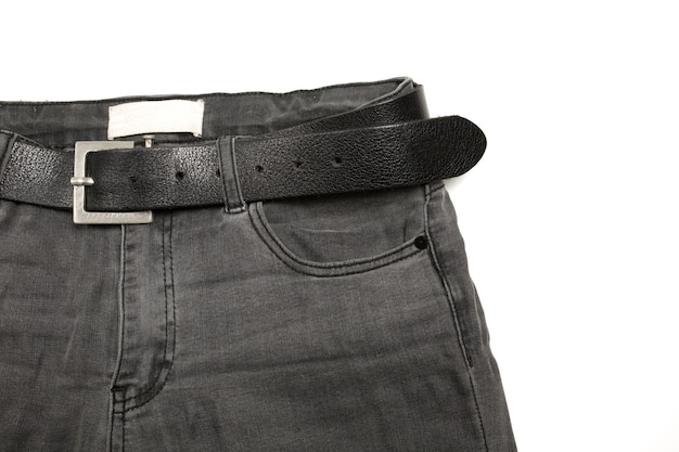 Grijze damesjeans met hoge taille en zwarte leren riem