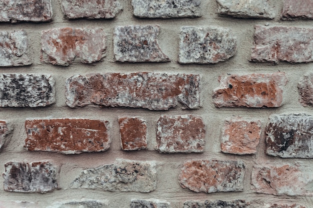 Foto grijze en rode bakstenen muur