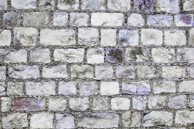 Grijze en violette grunge bakstenen muur achtergrondstructuur