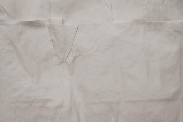 Foto grijze kleur verouderd nat papier gevouwen textuurlageneffect creatieve abstracte kunstachtergrond ruimte kopiëren
