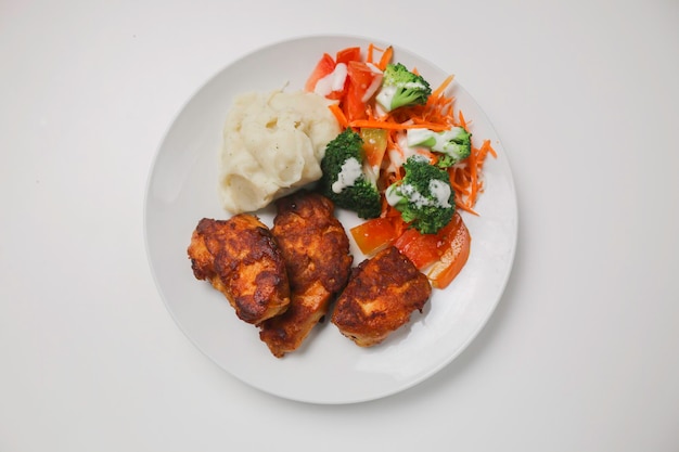 Griled chicken breast steak with vegetable and mash potatoes