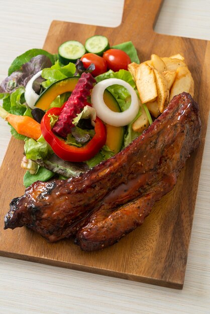 grill barbecue pork spare ribs with vegetables