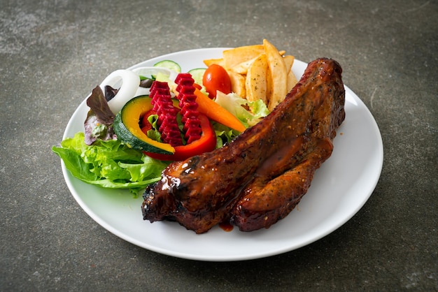 grill barbecue pork spare ribs with vegetables