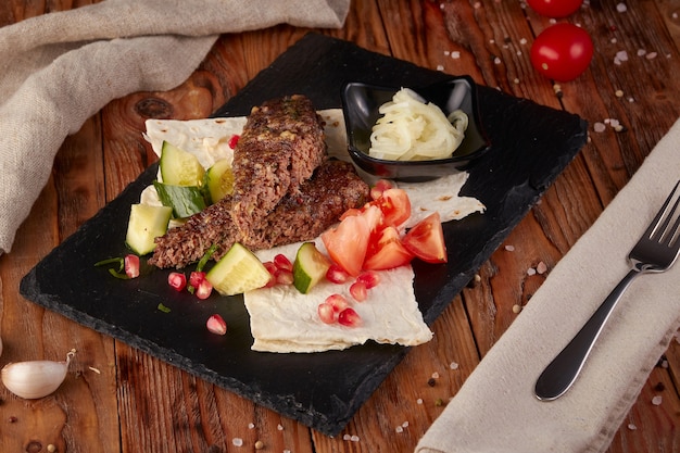 Grill lula kebab, wooden background