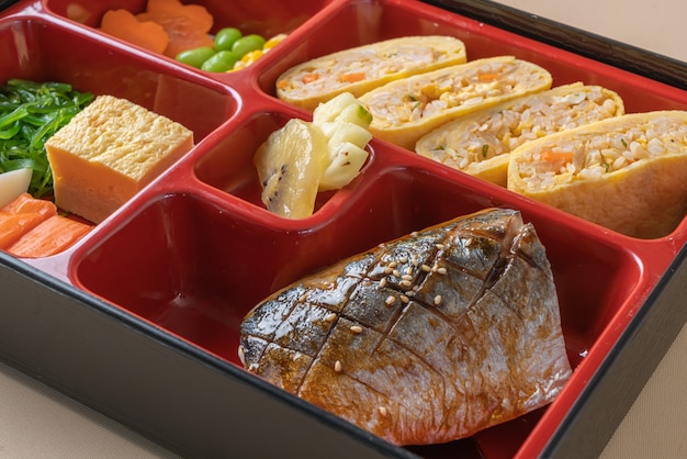 Grill mackerel saba fish with appetizer in bento set - Japanese food style