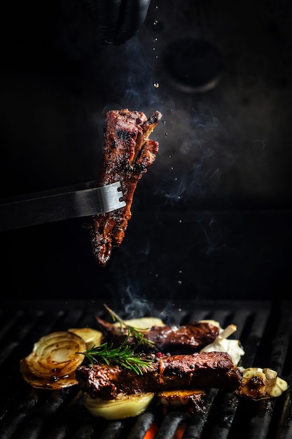 Grilled barbecue ribs pork with rosemary. ribs with barbecue sauce