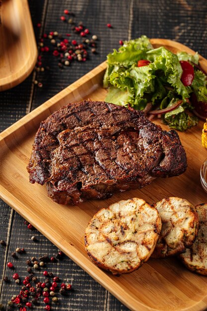 Grilled beef steak set with salad and sauce