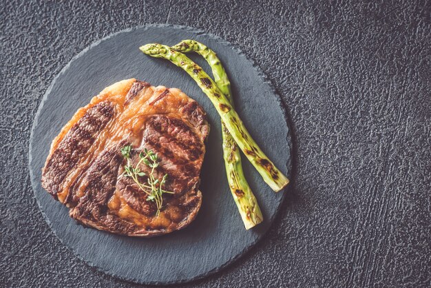 Grilled beef steak with asparagus