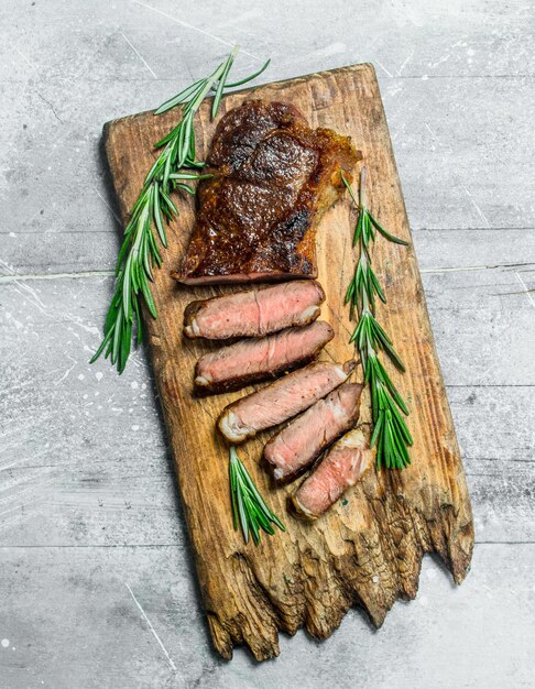 Grilled beef steak with rosemary and spices