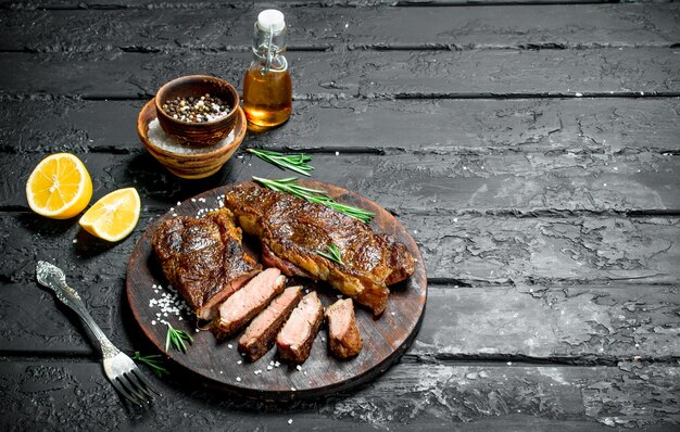 Grilled beef steaks on a cutting Board