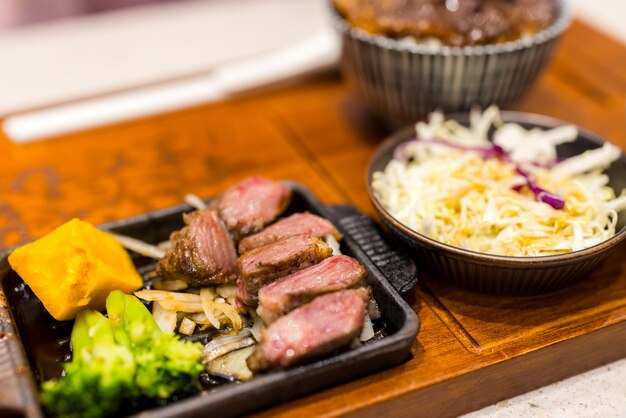 Grilled beef with rice bowl in the restaurant