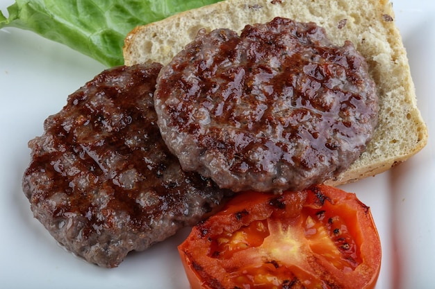 Foto cotoletta di hamburger alla griglia