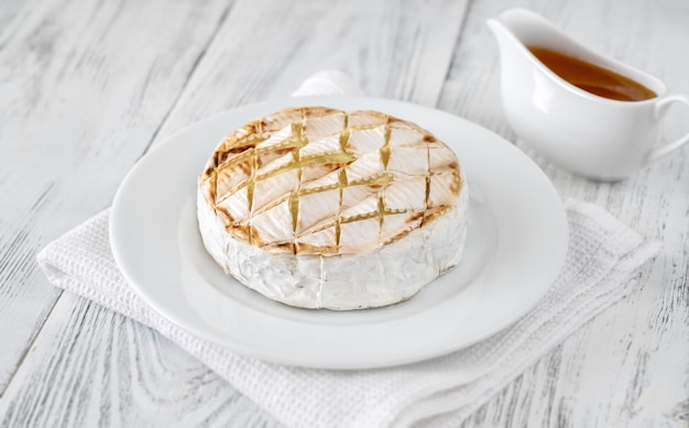 Grilled Camembert cheese on the serving plate