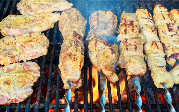 Grilled caucasus barbecue in smoke meat skewers