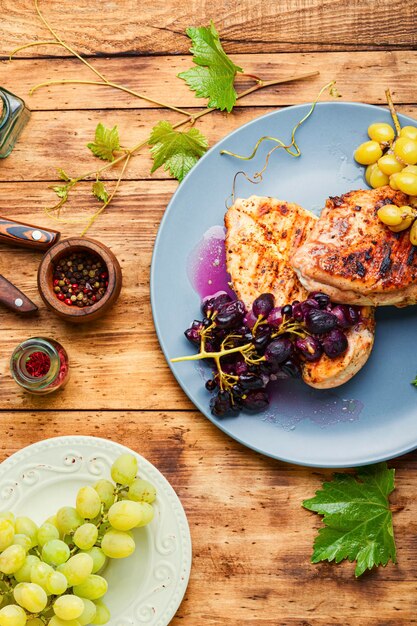 Grilled chicken breast marinated in grape sauce