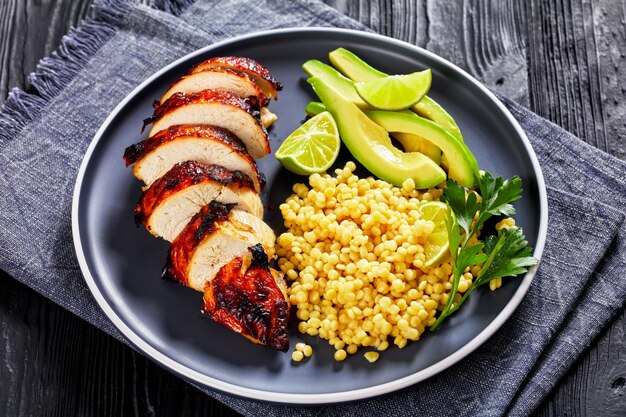 Grilled chicken breast with ptitim avocado lime