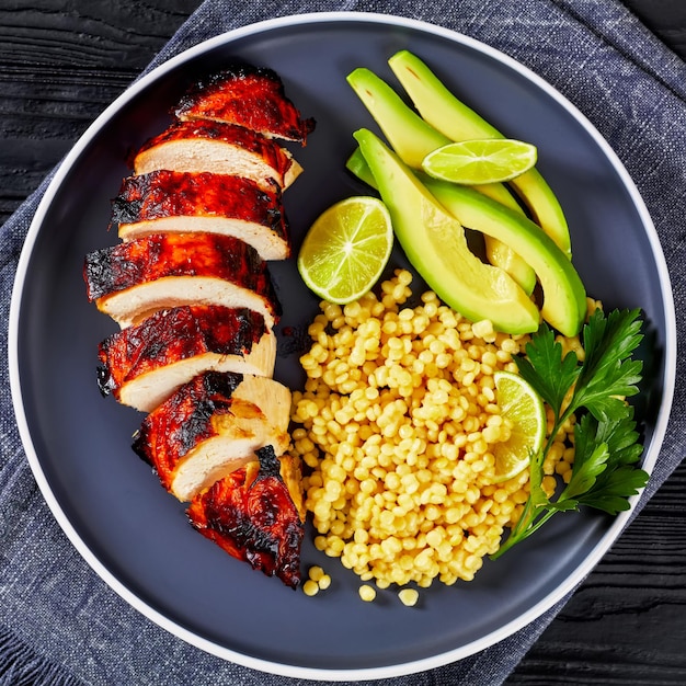 Grilled chicken breast with ptitim avocado lime