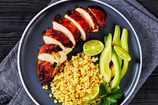 Grilled chicken breast with ptitim avocado lime