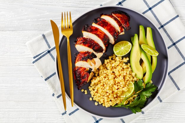 Grilled chicken breast with ptitim avocado lime