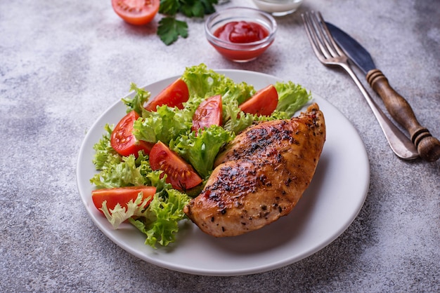 Grilled chicken breast with vegetable salad