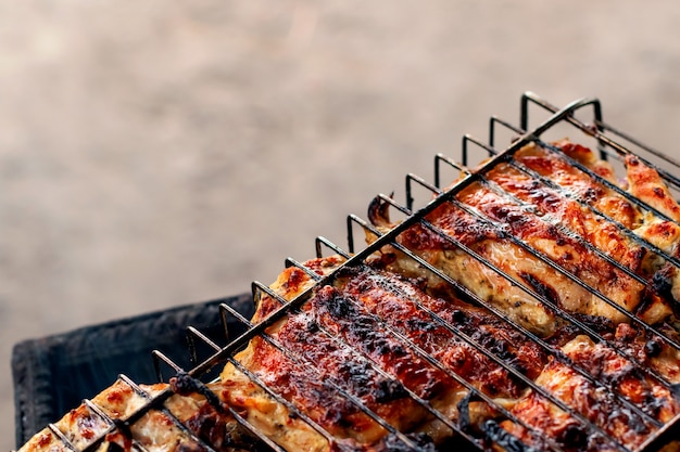 Grilled chicken leg snack for outdoor party.