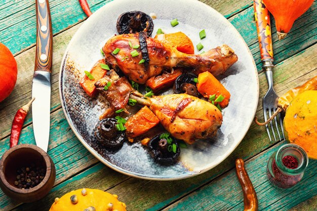 Grilled chicken legs with pumpkin