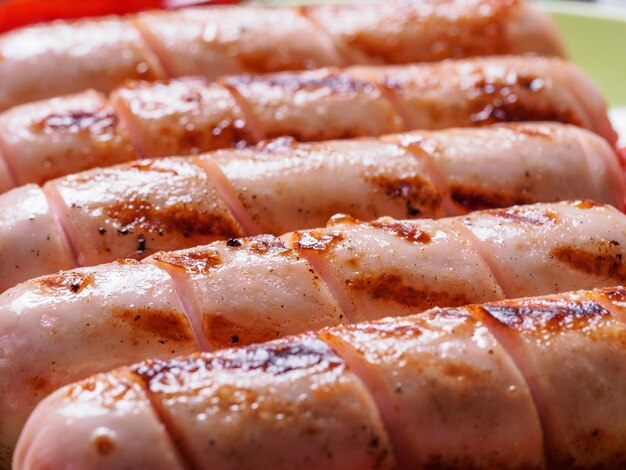 Grilled chicken sausages close up