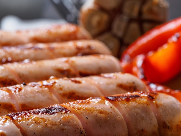 Grilled chicken sausages close up