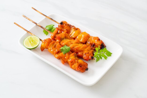 Grilled chicken skewer with herbs and spices