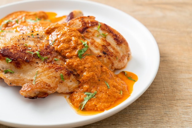 grilled chicken steak with red curry sauce - muslim food style