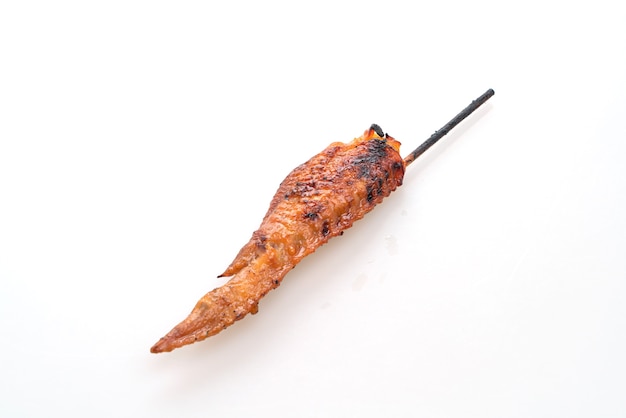 Grilled chicken wing skewer isolated