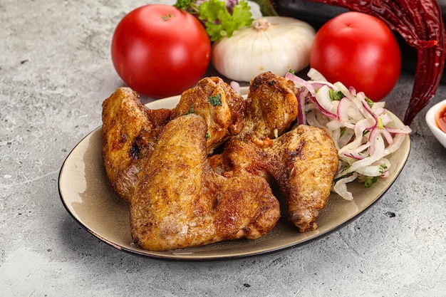 Grilled chicken wings barbecue with sauce