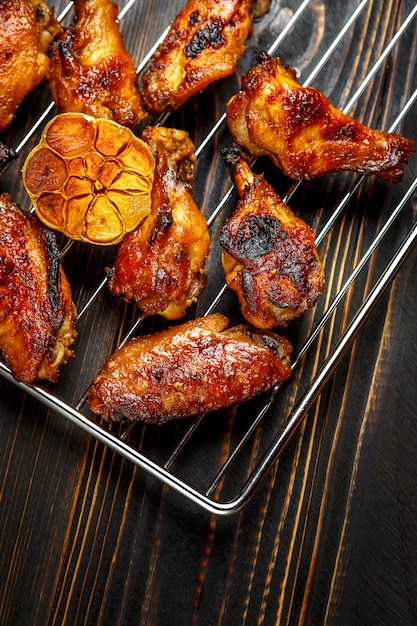 Grilled chicken wings on the grill