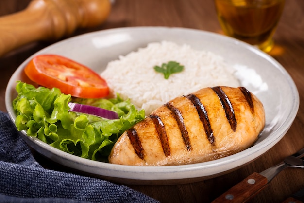 Grilled chicken with salad and rice