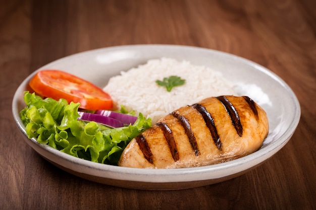 Grilled chicken with salad and rice