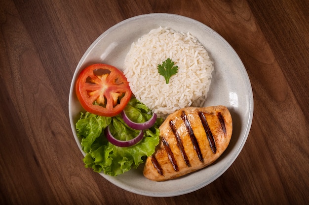 Grilled chicken with salad and rice